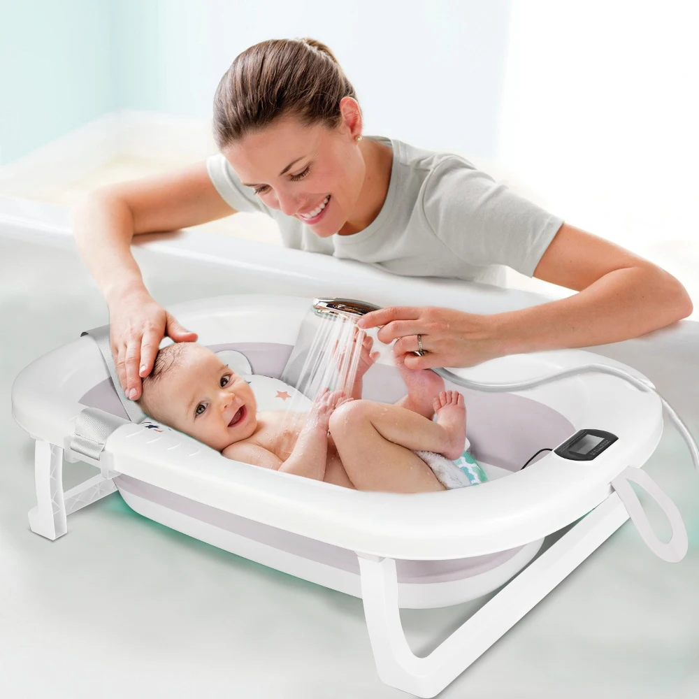 Baignoire Bébé Pliable Thermomètre Intégré - Confort & Sécurité Baignoire bébé pliée, montrant son design compact