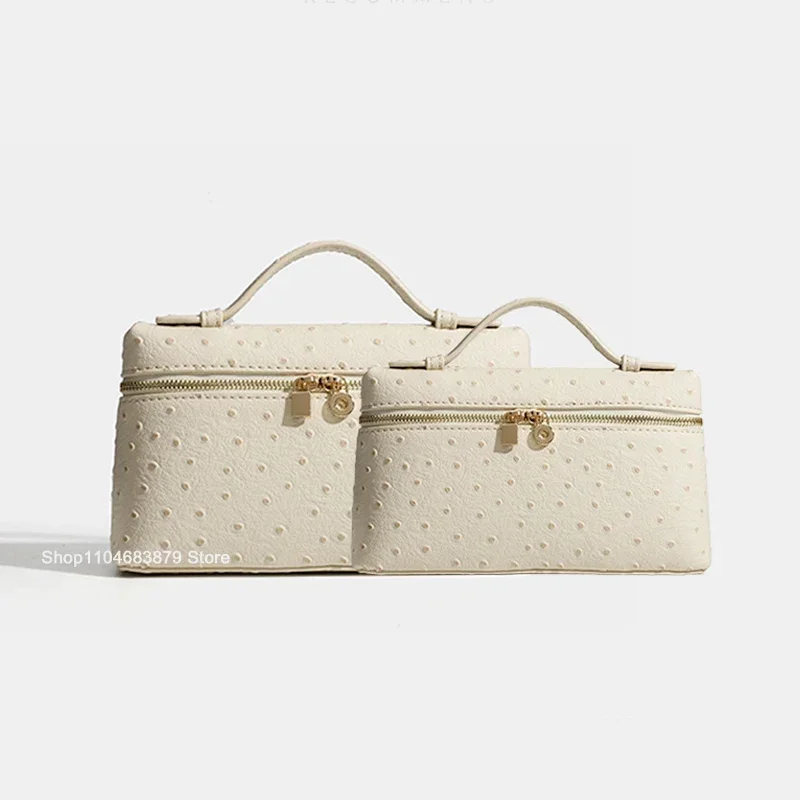 Trousse à maquillage en cuir refendu motif pois
