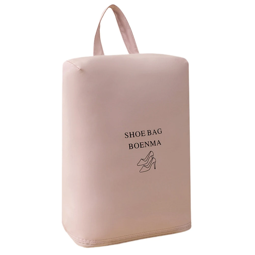 Sac de Voyage à Chaussures Portable - Anti-Poussière & Imperméable Sac à chaussures gris plié à plat sur un fond blanc, montrant sa compacité