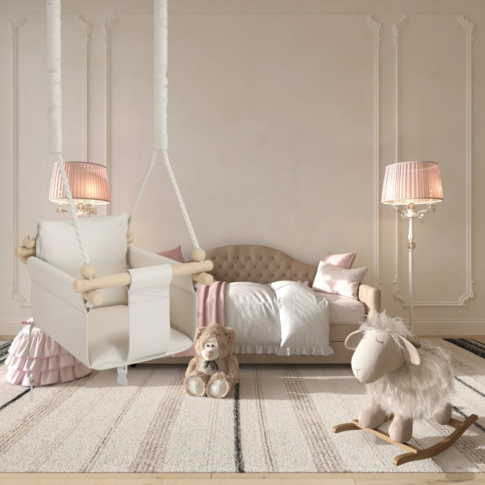 Balançoire bébé MAMOI installée dans un jardin