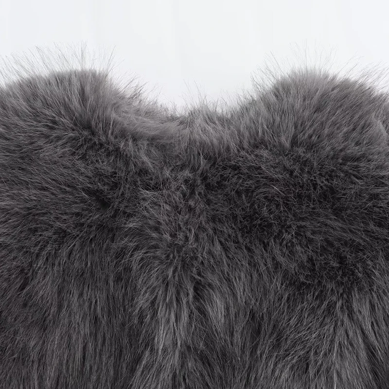 Détail de la fermeture éclair d'une veste courte femme