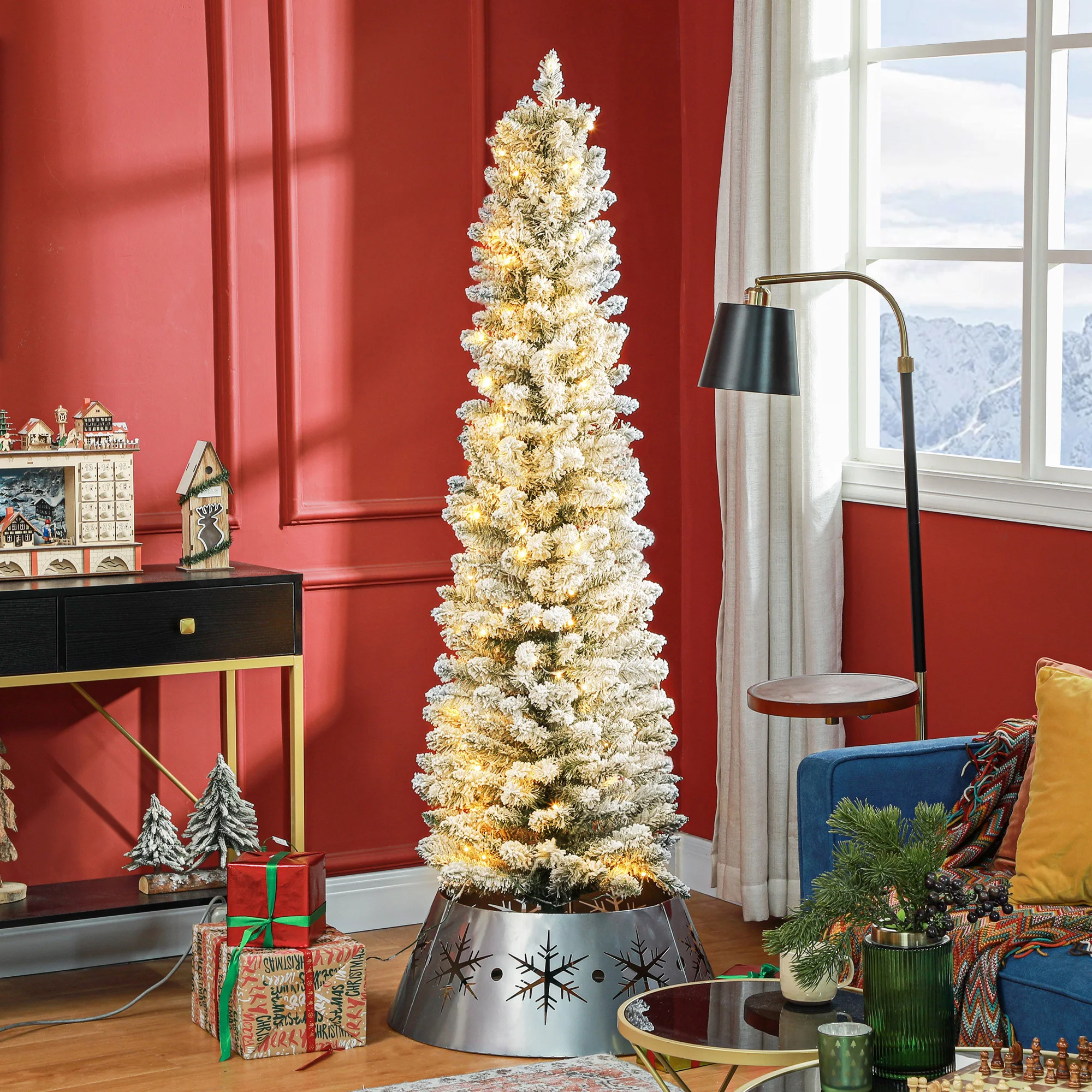 Détail branches enneigées et lumières LED sapin