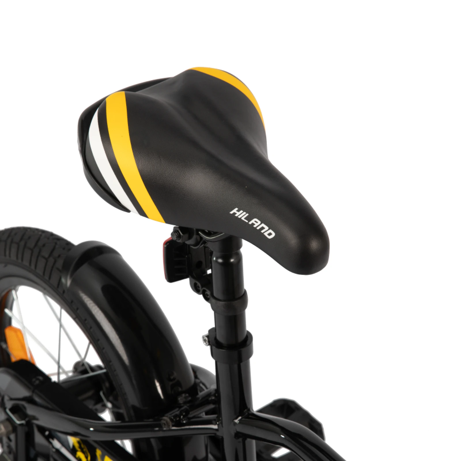 Enfant souriant sur son vélo JOYSTAR avec des roues d'apprentissage