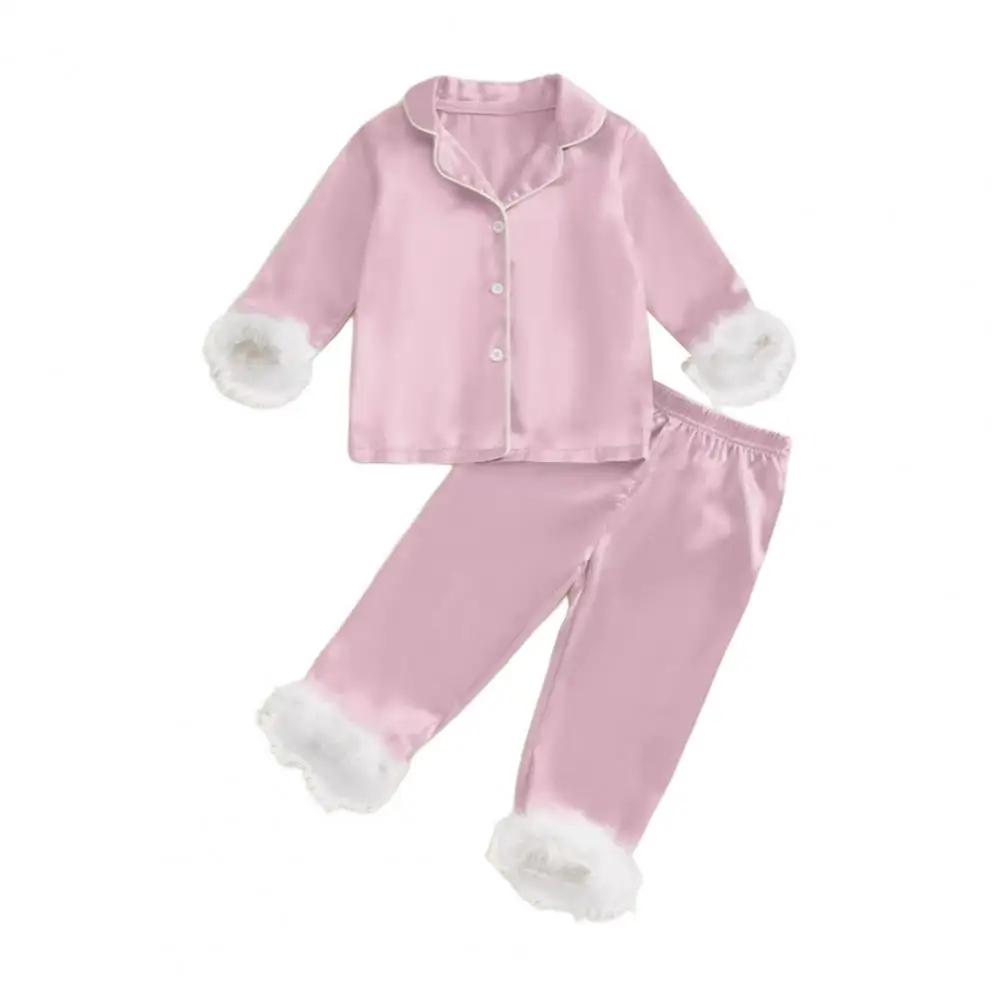 Ensemble pyjama enfant style Père Noël, idéal pour l'hiver