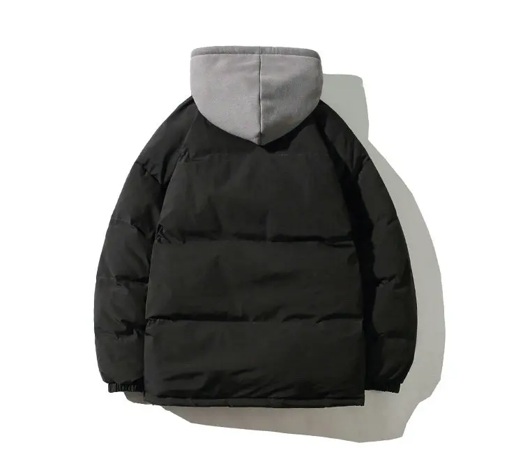 Gros plan sur la texture du tissu et la capuche de la veste d'hiver